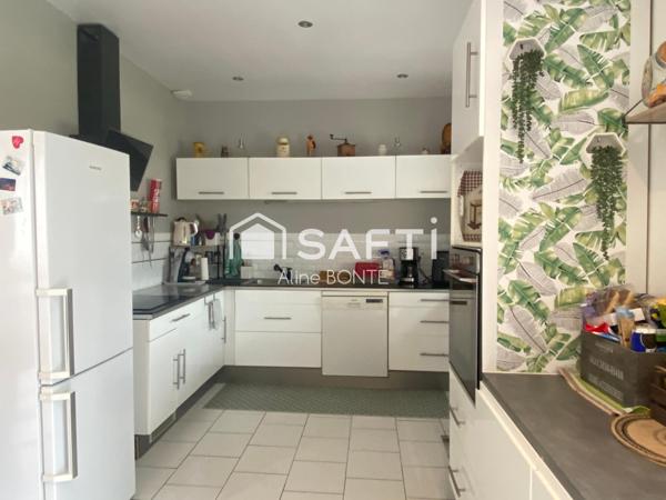 Maison centre ville avec piscine chauffée