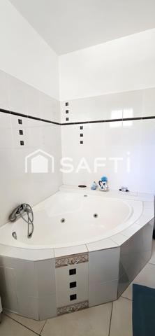 Villa au cœur d'un cadre verdoyant