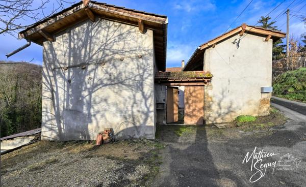 Fermette P3 sur 1860m² + garage + 2 ha de terrains agricoles.