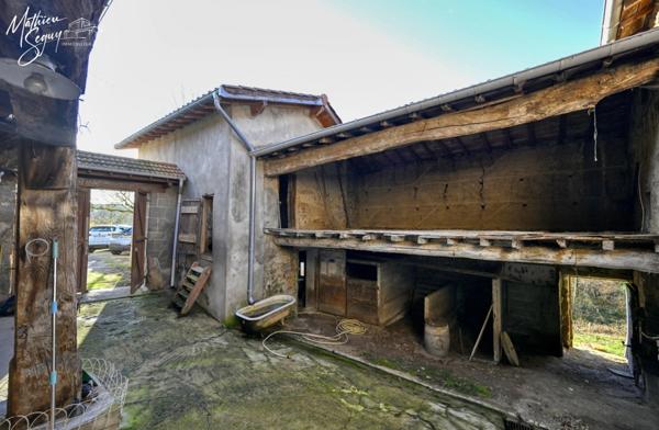 Fermette P3 sur 1860m² + garage + 2 ha de terrains agricoles.