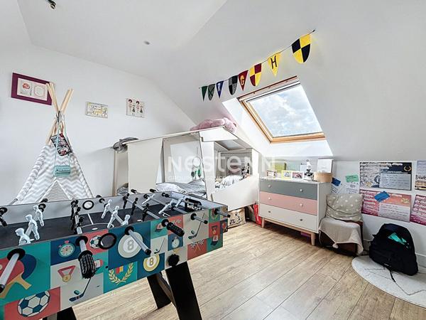 Maison familiale de 113 m², 4 chambres, avec piscine chauffée , jardin et sous-sol complet/garage au coeur d'Avrillé