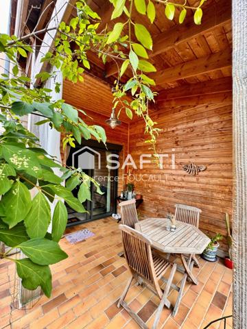 Maison de ville, parking.