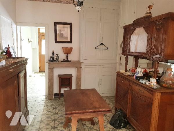 Maison à rénover avec jardin et garage bâtie sur 463 m²