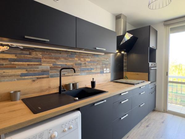 Appartement 3 chambres de 97m2 avec balcon et cave
