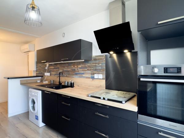 Appartement 3 chambres de 97m2 avec balcon et cave