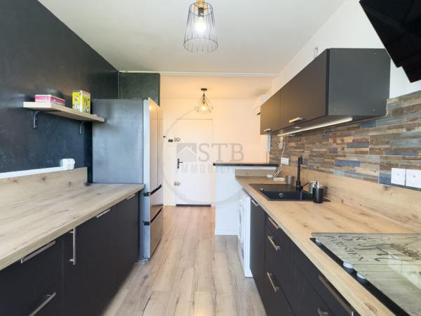 Appartement 3 chambres de 97m2 avec balcon et cave