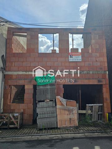 Vente de permis d'une maison à terminer;