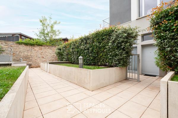 Duplex avec jardin et terrasse