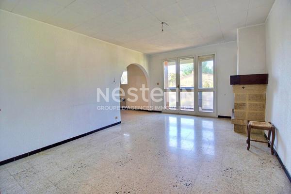 Marignane- Appartement 3/4 pièces de 78 m² avec une véranda, un jardin et un garage.