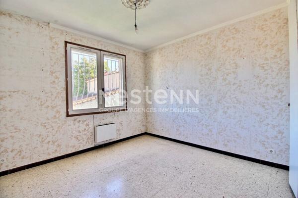 Marignane- Appartement 3/4 pièces de 78 m² avec une véranda, un jardin et un garage.