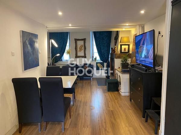 Immeuble 222 m2 avec multiples espaces habitables et terrasse