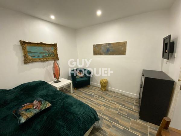 Immeuble 222 m2 avec multiples espaces habitables et terrasse