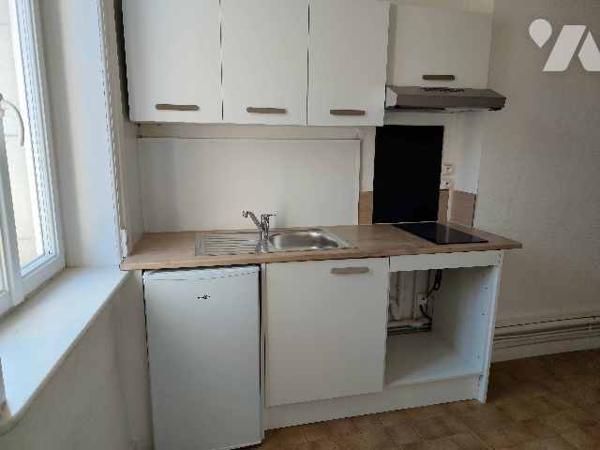 Immeuble de Rapport à usage commercial et habitation à vendre à 15 Km de Lille Ouest (Armentières).