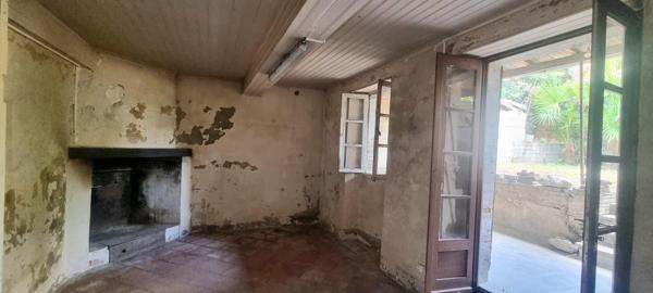 Maison à rénover avec jardin,  fort potentiel