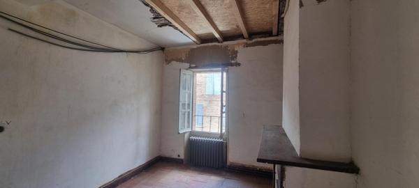 Maison à rénover avec jardin,  fort potentiel