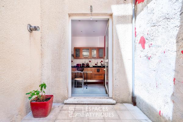 Loft avec patio dans ancienne usine de matelas