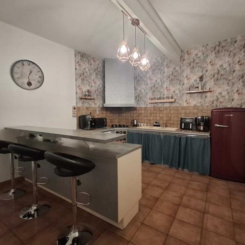 IMMEUBLE AVEC LOCAL COMMERCIAL ET HABITATION