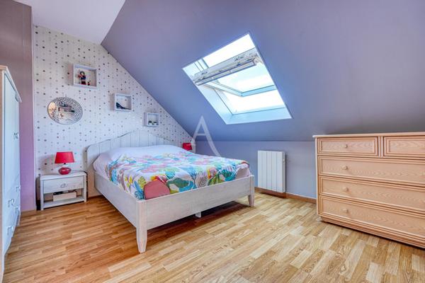 Maison individuelle avec sous-sol total, jardin intimiste de 2 412 m2 et suite parentale au RDC