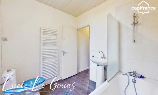 Appartement de 75m² 3 chambres, jardin et stationnement privatif