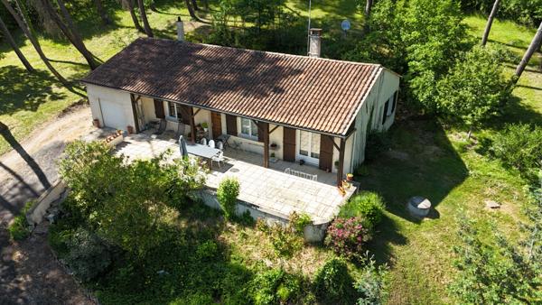 Maison dans un écrin de verdure