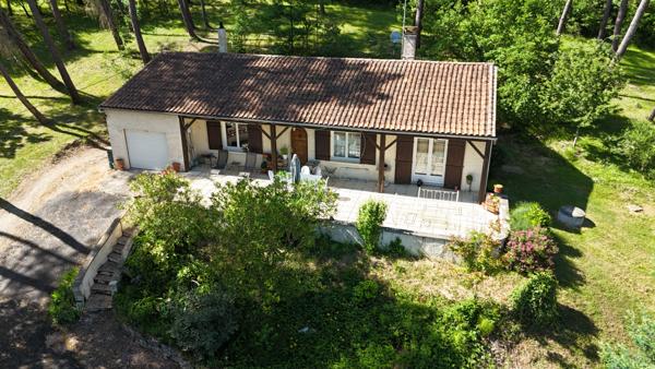 Maison dans un écrin de verdure