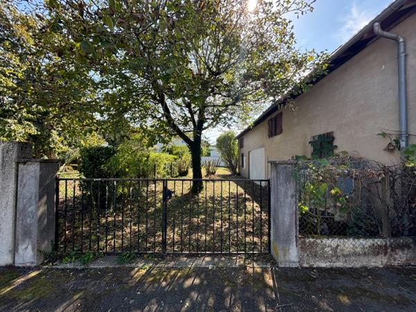 Maison centre ville de plein pied avec double garage et jardin