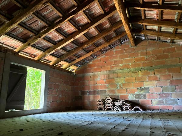 Maison centre ville de plein pied avec double garage et jardin