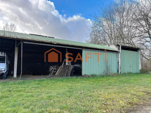 Exclusivité – Terrain constructible de 2356m² avec hangar agricole
