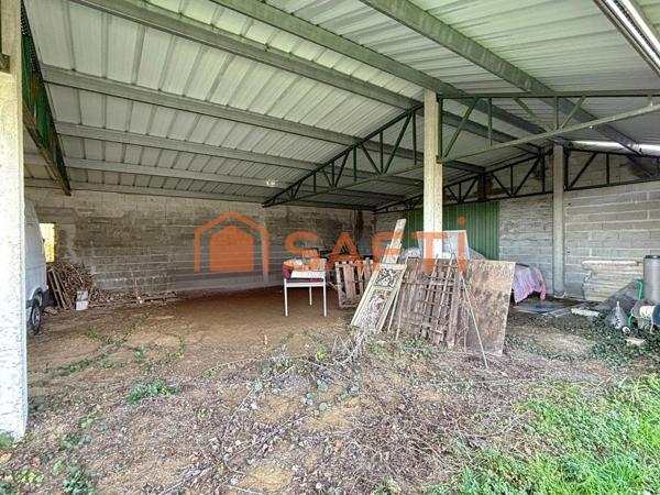 Exclusivité – Terrain constructible de 2356m² avec hangar agricole