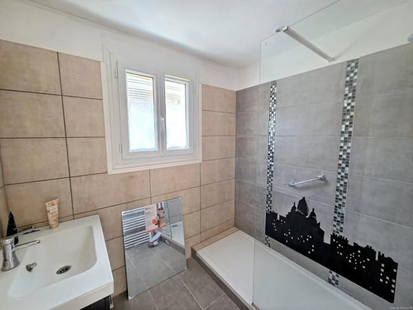 Appartement T3/4 avec terrasse et garage