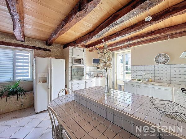 A Vendre Maison en pierre rénovée de 175 m² avec jardin et garage dans un hameau de Condom