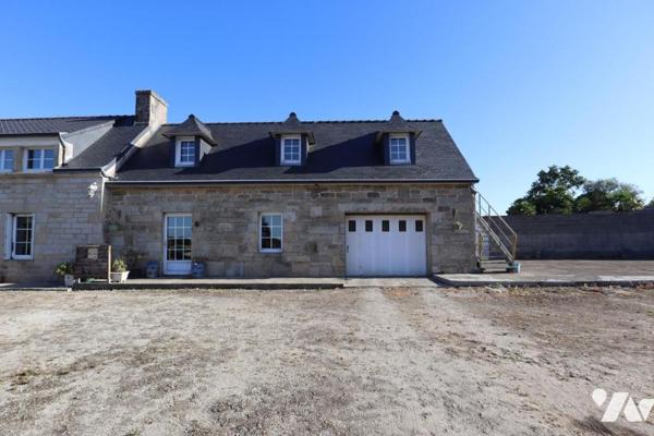 Un corps de ferme avec des dépendances - Pluguffan