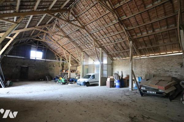 Un corps de ferme avec des dépendances - Pluguffan