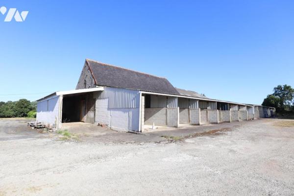 Un corps de ferme avec des dépendances - Pluguffan