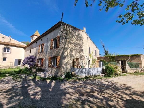Maison familiale 6 pièces de 132 m² avec jardin, garage et dépendances