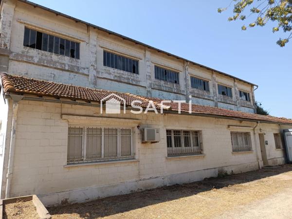 BATIMENTS SUR 6749 M2 DE TERRAIN EN BORD DE RN 113