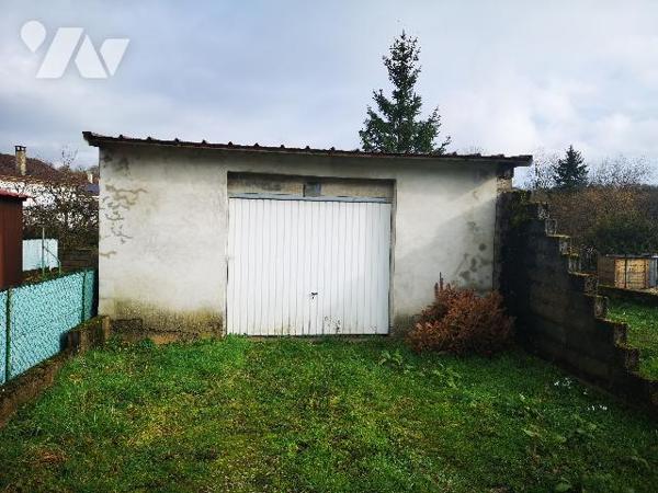 Chamouilley, maison de ville F4 avec terrain et garage