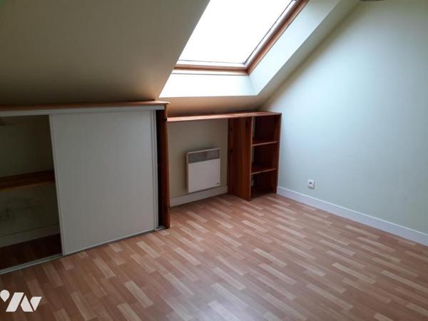 Immeuble au centre ville de LE FAOUËT avec local commercial et appartement loués