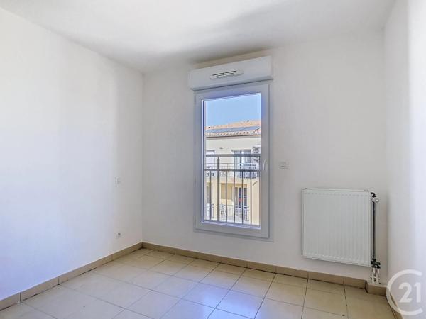 Appartement F3 à vendre  3 pièces - 60,47 m 2   JUVIGNAC  - 34