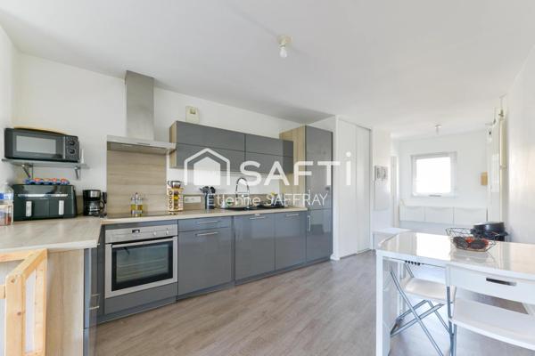 Appartement lumineux avec balcon et 2 places de parking