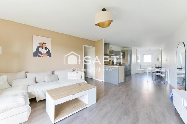 Appartement lumineux avec balcon et 2 places de parking