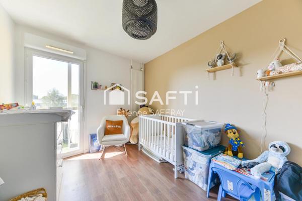 Appartement lumineux avec balcon et 2 places de parking