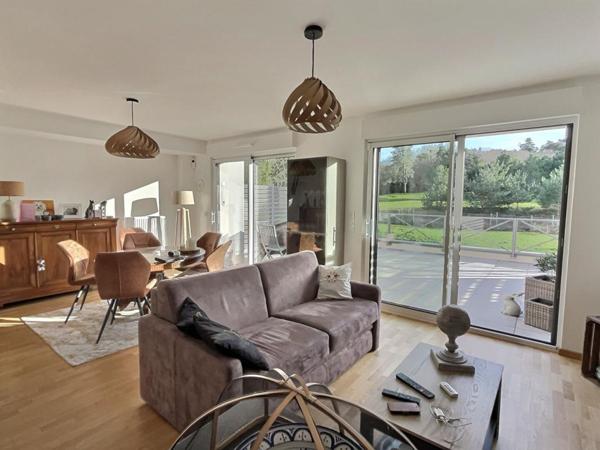 Superbe duplex 2 CHAMBRES , terrasse , garage et cave avec vue golf - 72.43 m2