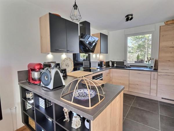 Superbe duplex 2 CHAMBRES , terrasse , garage et cave avec vue golf - 72.43 m2