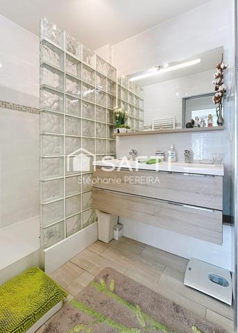 Appartement avec terrasse, jardin et double-box