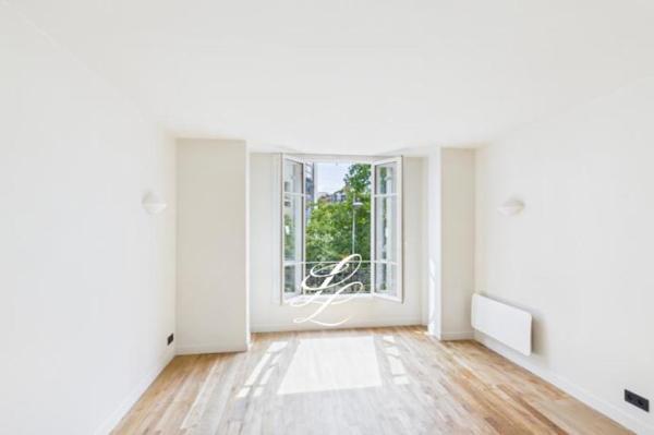 Vente - Appartement 3 pièces 61 m 2 Paris (75015)