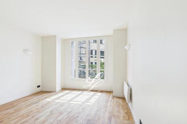 Vente - Appartement 3 pièces 61 m 2 Paris (75015)