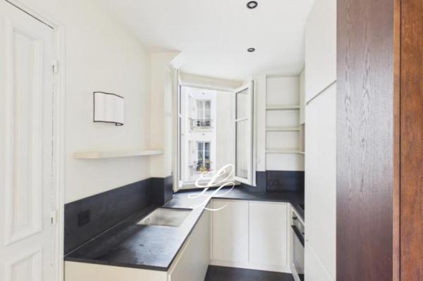 Vente - Appartement 3 pièces 61 m 2 Paris (75015)