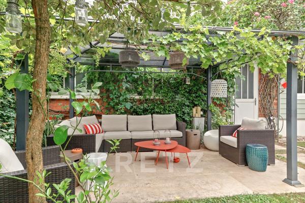 Maison d'exception avec grand jardin et dépendance au coeur de Courbevoie