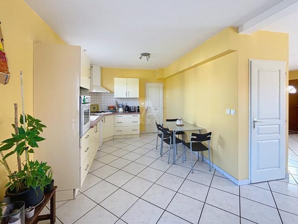 Maison T5 avec garage et jardin